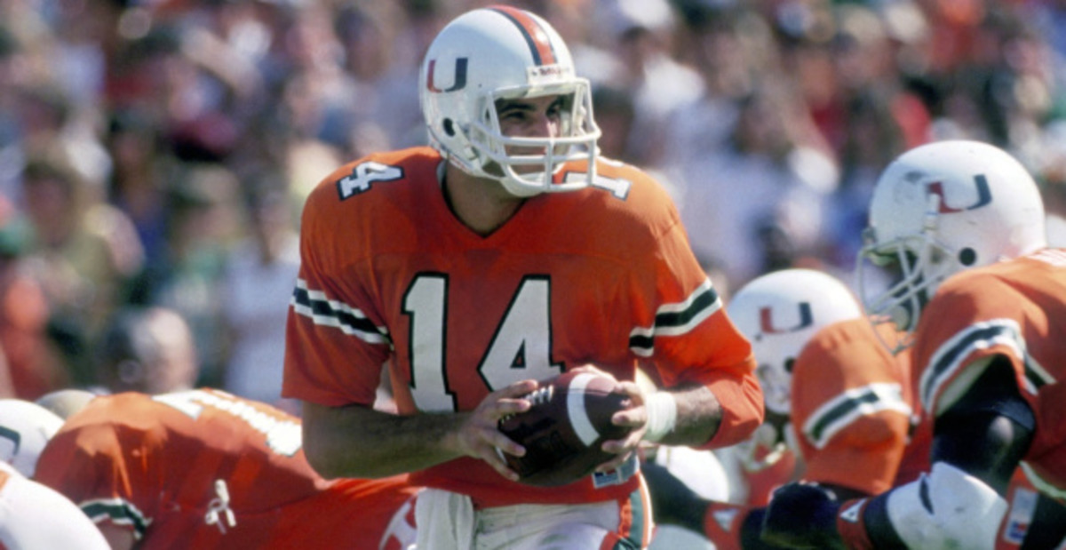 Miami Hurricanes quarterback Vinny Testaverde attempts a pass during a college football game.